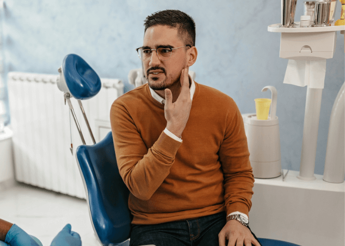 man having toothache